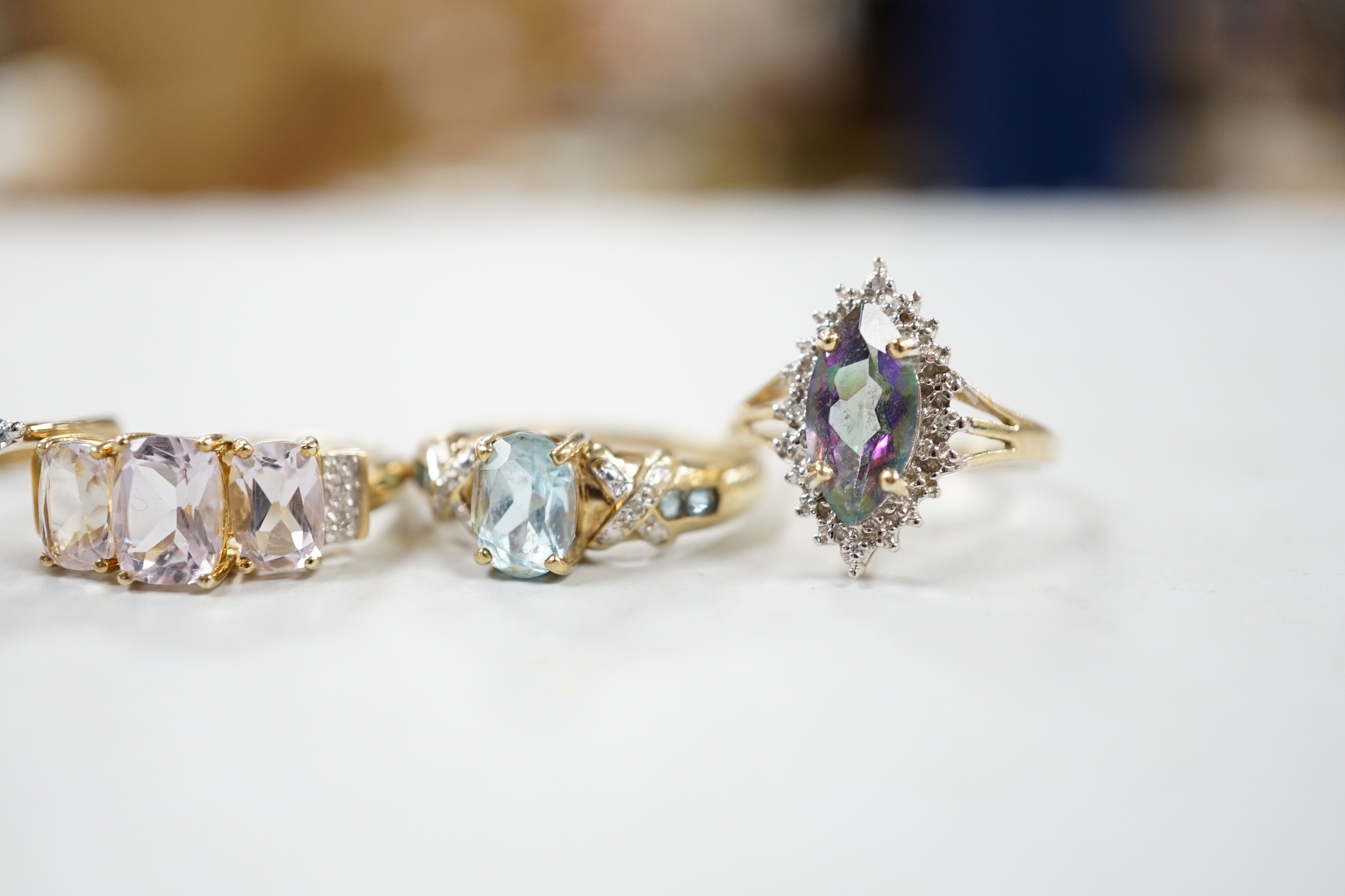 Five assorted modern 9ct gold and gen set rings, including kunzite and diamond, size N, gross 17.5 grams.